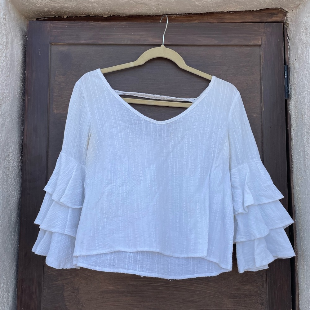White bell sleeve top